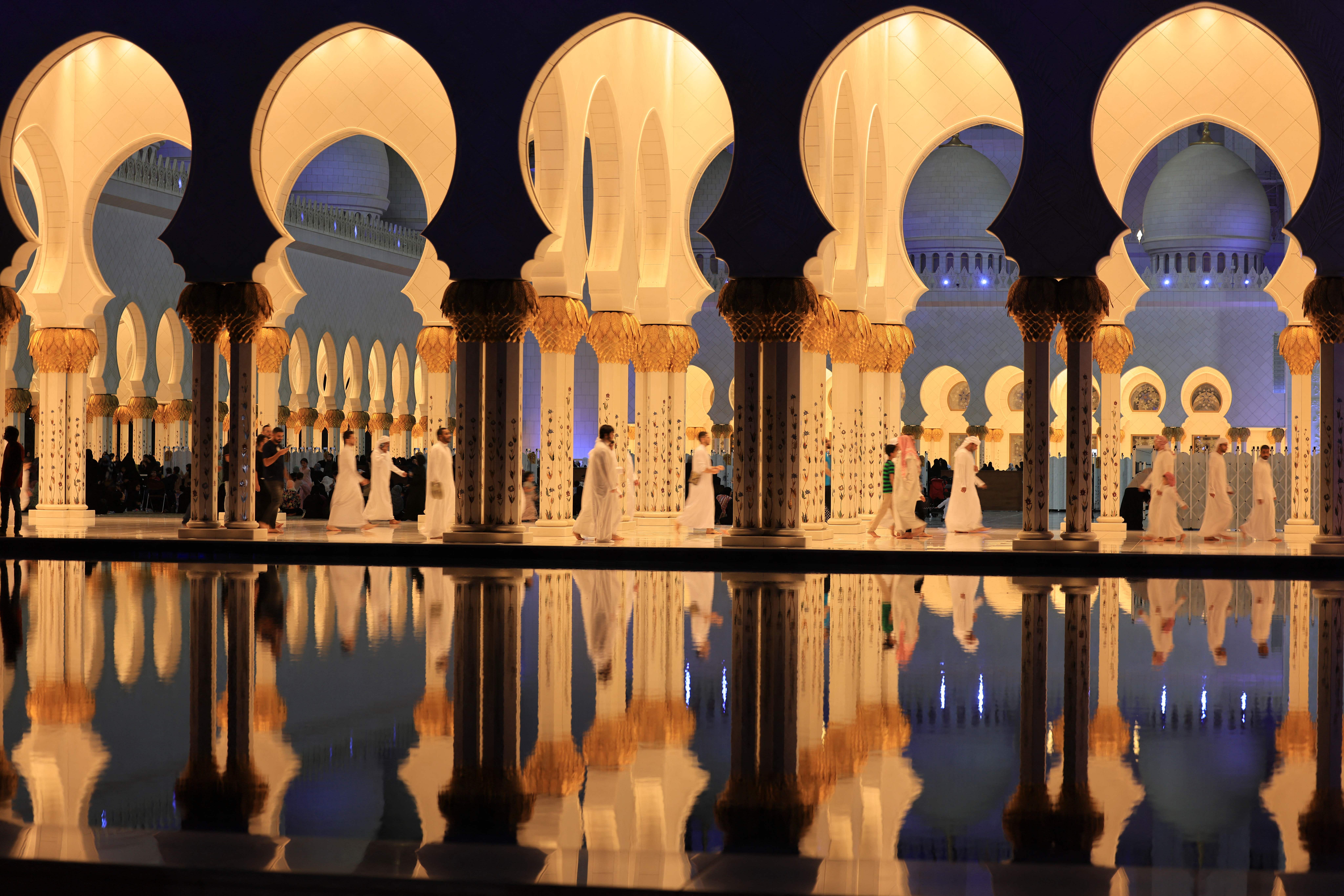 Believers walk through the courtyard of the Sheikh Zayed Grand Mosque in Abu Dhabi during Ramadan in 2023. (Photo: Getty Images)