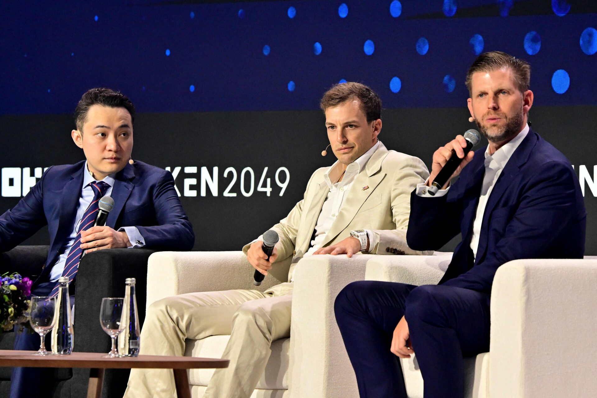 Eric Trump, World Liberty Financial co-founder Zach Witkoff, and Justin Sun, the founder of cryptocurrency TRON, participate in a session during the Token 2049 crypto conference in Dubai on Thursday. (Giuseppe Cacace /AFP via Getty Images)