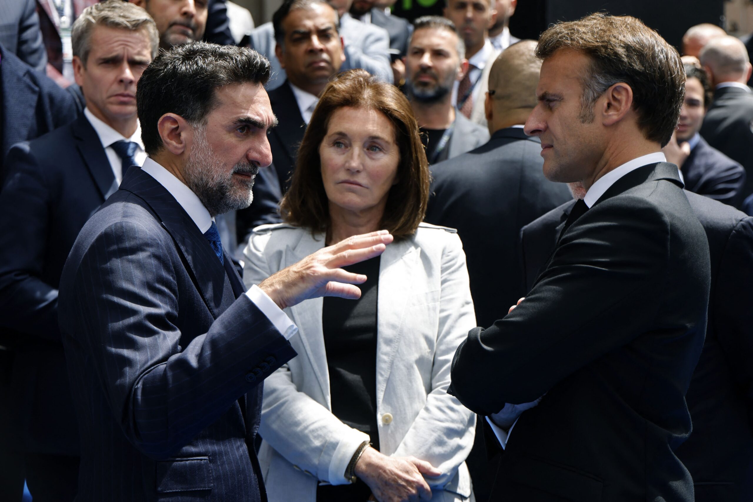 Yasir Al-Rumayyan, Governor of Saudi Arabia’s Public Investment Fund and Chairman of  the FII Institute (left), meets with French President Emmanuel Macron following the FII Priority Europe Summit in the Albanian capital of Tirana on Saturday. (Ludovic Marin / AFP via Getty Images)
