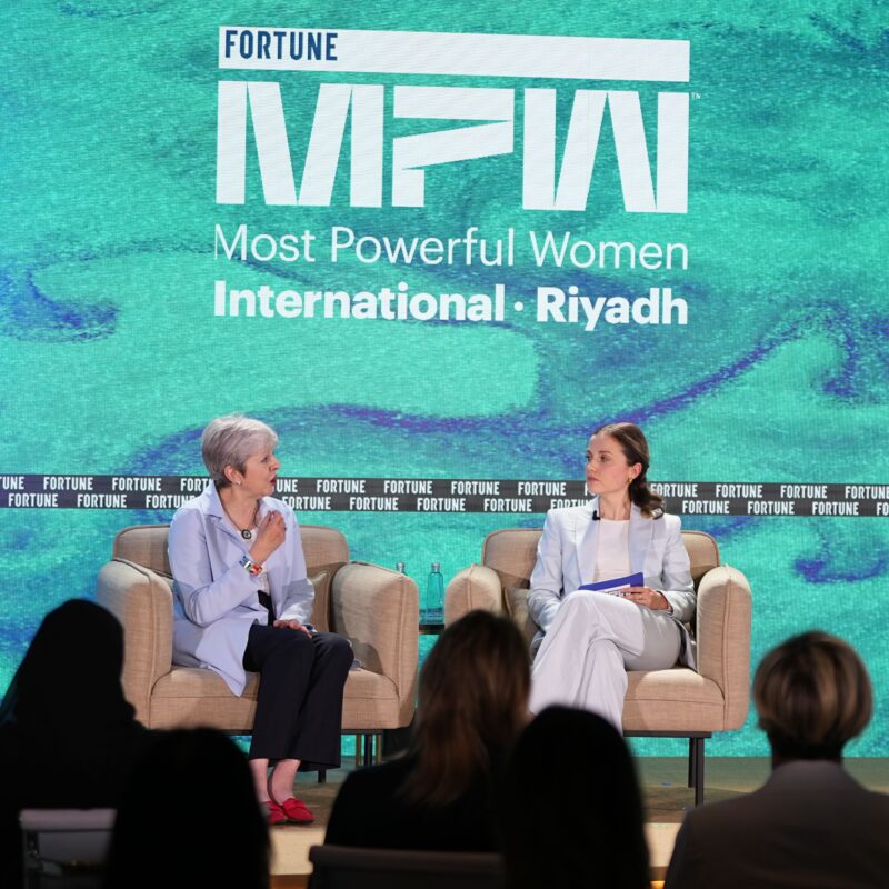 Former U.K. Prime Minister Theresa May appeared on stage alongside Editorial Director Ellie Austin at the Fortune Most Powerful Women International Summit at the St. Regis in Riyadh on Wednesday. (Amal Alhasan/Getty Images for Fortune Media)