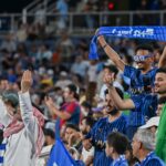 Fans of Saudi soccer club Al Hilal celebrate during the FIFA Club World Cup 2025 round 16 match against Manchester City at Camping World Stadium in Orlando, Florida, on Monday. Hilal stunned commentators when they knocked out the defending champions during extra time in the seven-goal thriller. (Waleed Zein/Anadolu via Getty Images)