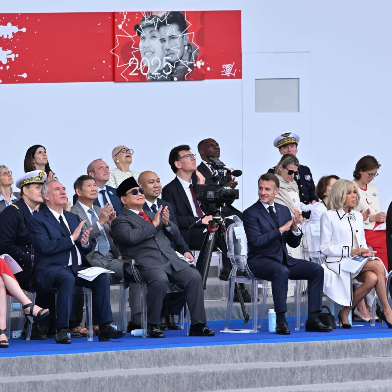 Emir of Kuwait Mishal Al-Ahmad Al-Jaber Al-Sabah (right) and Indonesian President Prabowo Subianto were among the foreign dignitaries who joined French President Emmanuel Macron and his wife Brigitte to watch the annual Bastille Day military parade on the Champs-Elysees Avenue in Paris on July 14. (Mustafa Yalcin/Anadolu via Getty Images)