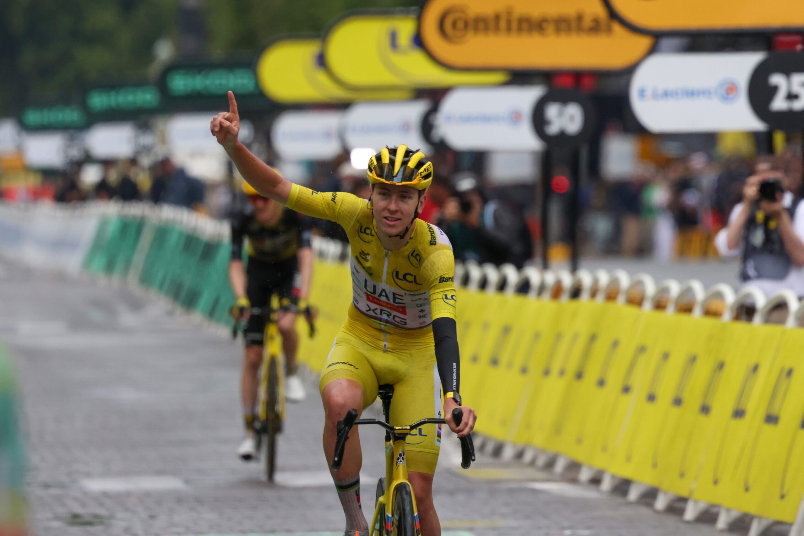 Slovenian cyclist Tadej Pogacar of UAE Team Emirates - XRG celebrates his fourth overall Tour de France victory at the finish line of Stage 21 at the Champs-Elysees in Paris on Sunday. (Photo by Sara Cavallini/Getty Images)